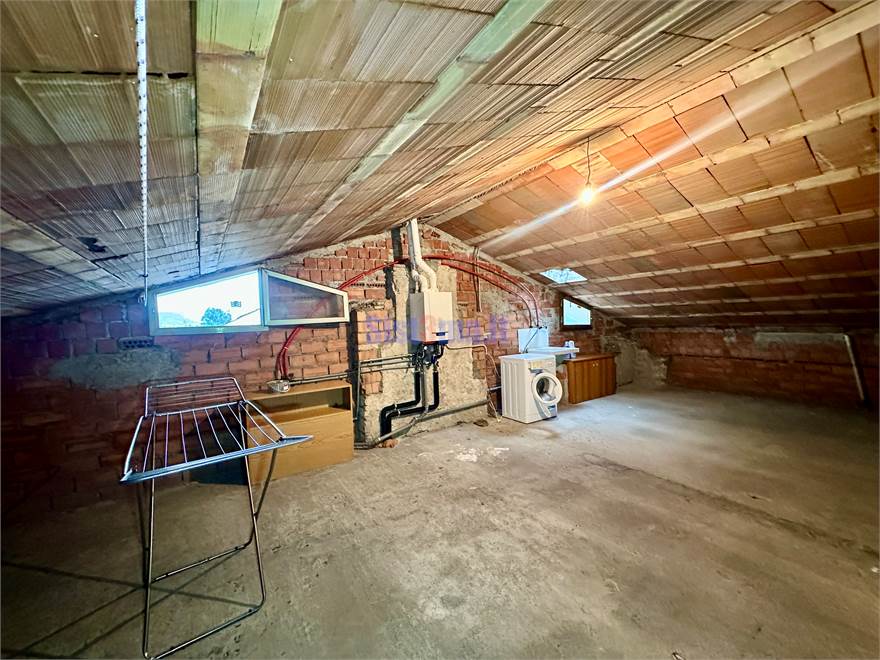 Mansarda con lavanderia