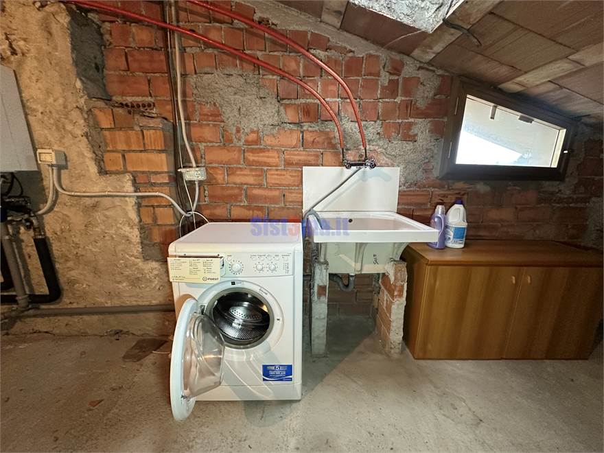 Mansarda con lavanderia